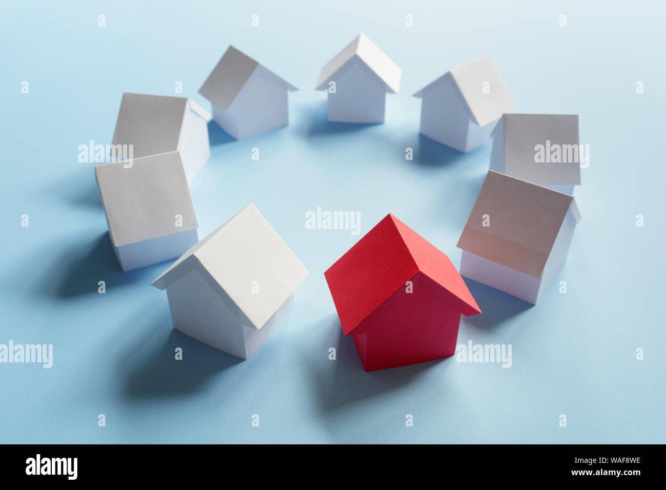 Searching for real estate property, house or new home, red house standing out Stock Photo