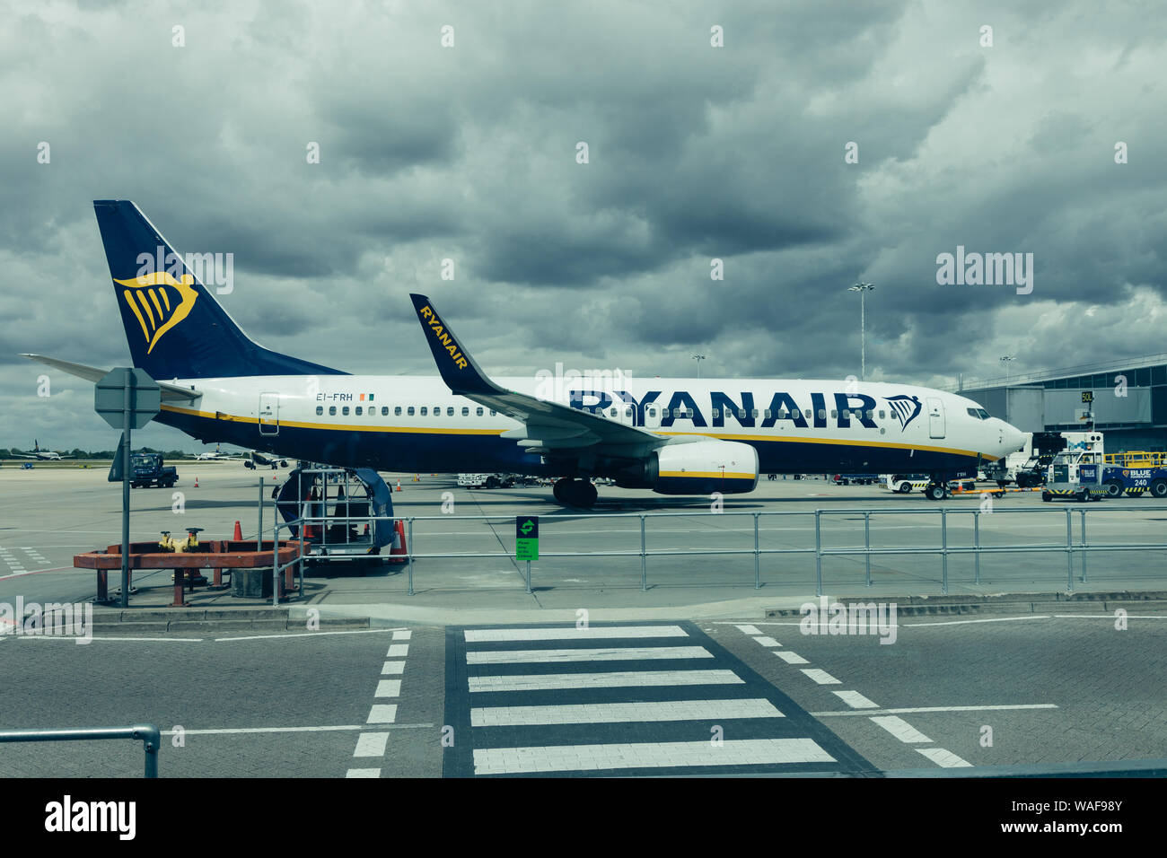 LONDON - AUGUST 7, 2019: Ryanair airplane at airport terminal at London Stansted Stock Photo