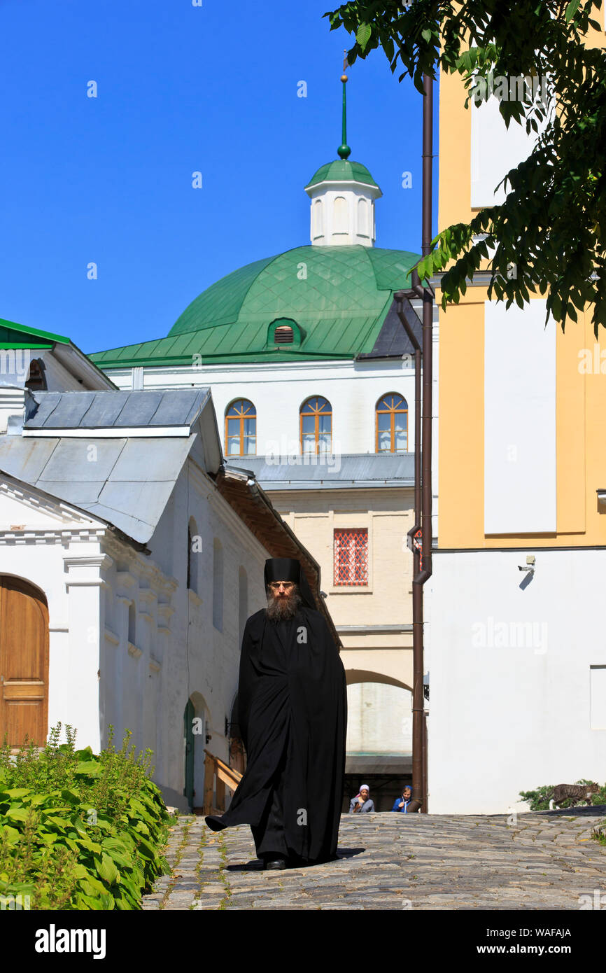 A Russian Eastern Orthodox monk at the Trinity Lavra of St. Sergius (1345) in Sergiyev Posad, Russia Stock Photo