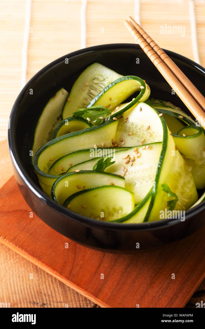 Healthy Food concept Cucumber Salad with soy sauce and Sesame Dressing