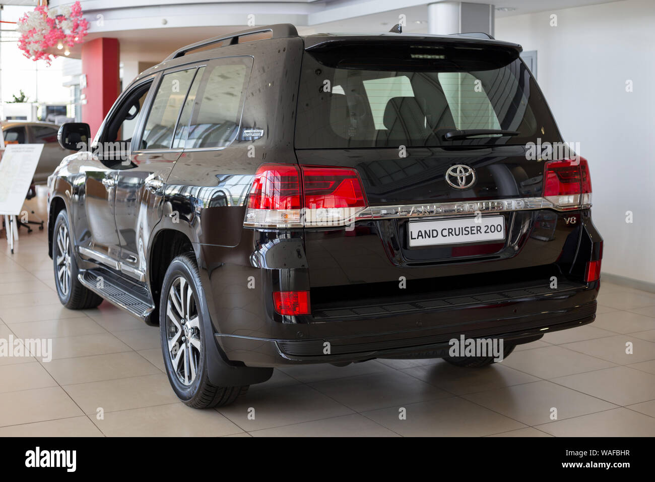 Russia, Izhevsk - July 18, 2019: New cars in the Toyota showroom. Modern Land  Cruiser 200. Back and side view. Famous world brand. Prestigious vehicle  Stock Photo - Alamy