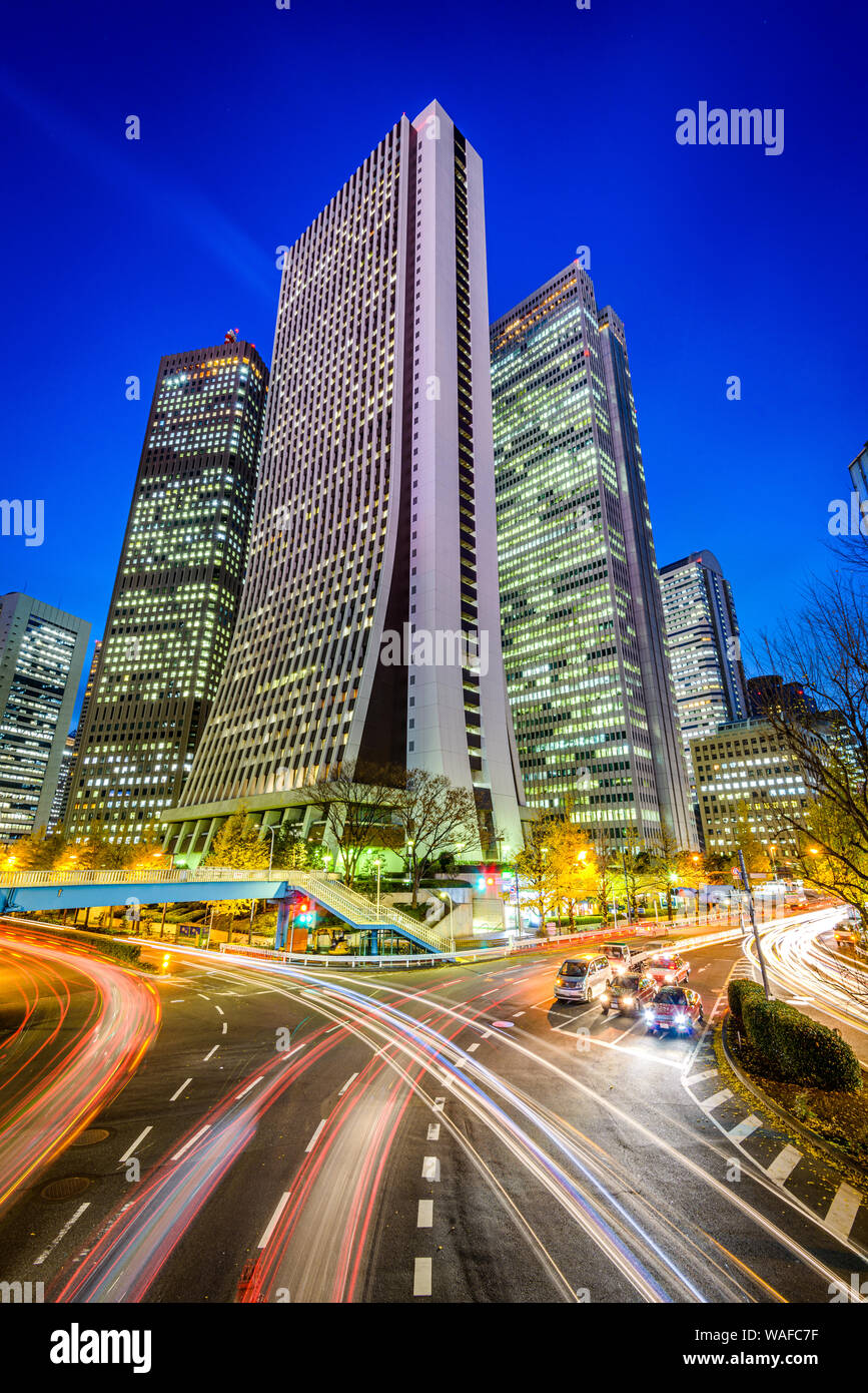 Tokyo, Japan intersection and skyscrapers cityscape in Nishi-Shinjuku skyscraper business district. Stock Photo
