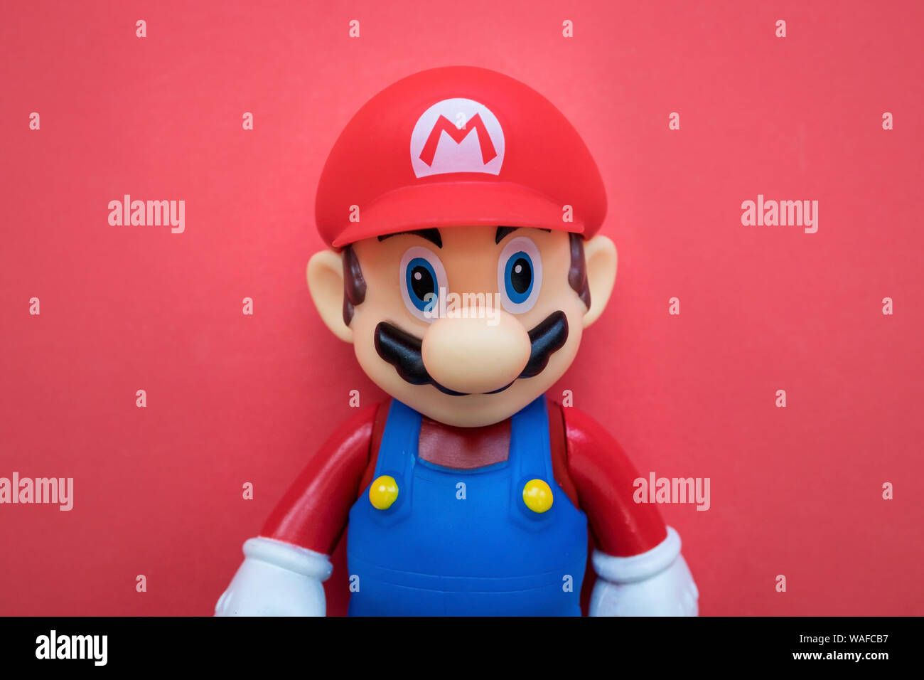 LONDON - JULY 31, 2019: Super Mario Nintendo video game character on red  background Stock Photo - Alamy