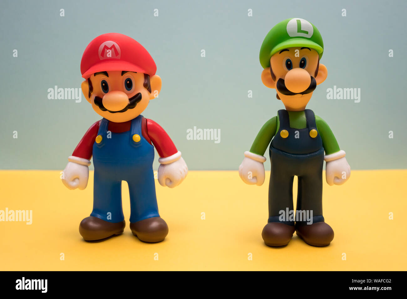 LONDON - JULY 31, 2019: Super Mario Luigi Nintendo video game character on  yellow background Stock Photo - Alamy