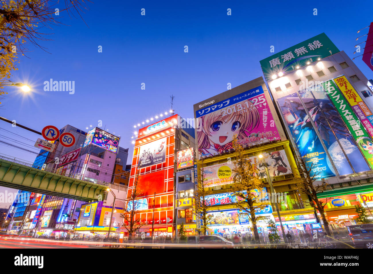 TOKYO - JANUARY 2: Akihabara district January 2, 2013 in Tokyo, JP. The district is a major shopping area for electronic, computer, anime, games and o Stock Photo