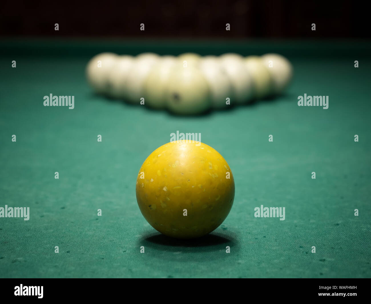 Billiard game. Old pool balls close-up on light beam. Shallow depth of field Stock Photo