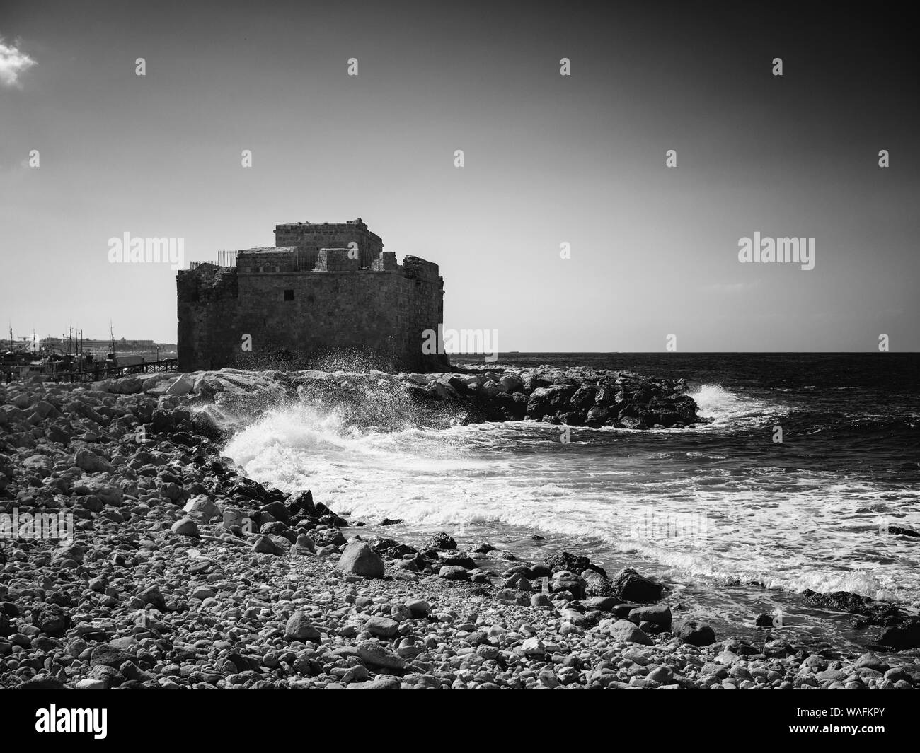 Paphos (Pafos), Cyprus - Seashore near the medieval fort in b&w Stock Photo