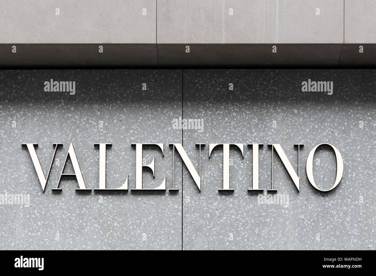 Copenhagen, Denmark - August 3, 2019: Valentino logo on a wall. Valentino  is an Italian clothing company founded in 1960 by Valentino Garavani Stock  Photo - Alamy