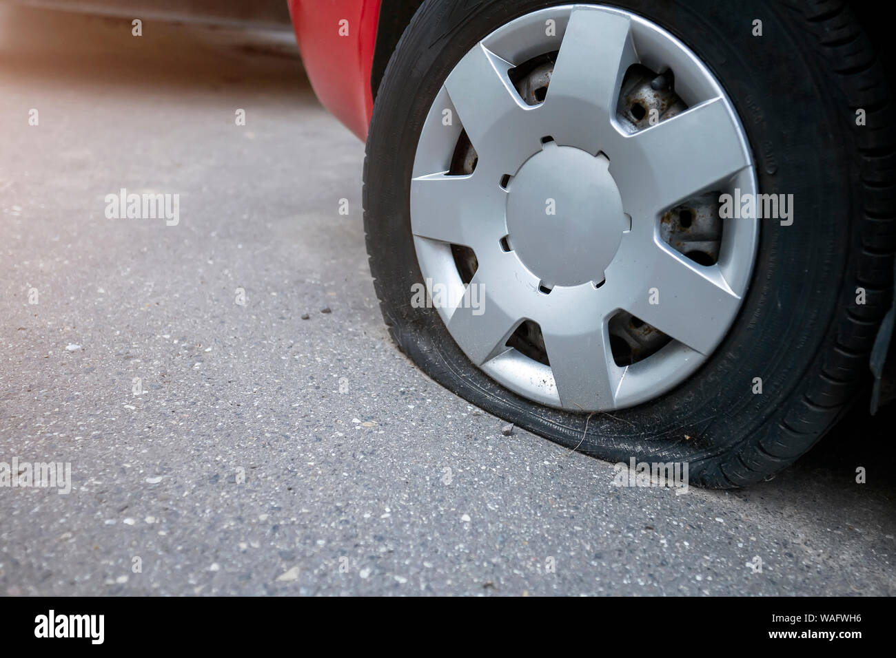 the punched wheel of the car close-up Stock Photo
