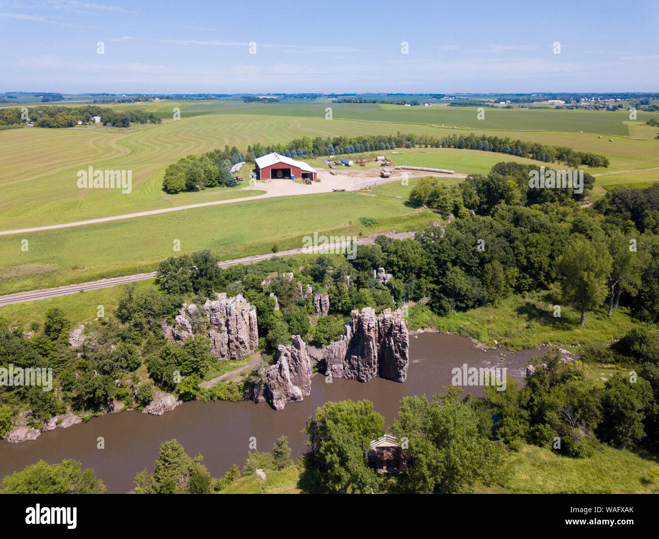 Aerial view of farmland, river, and cliffs in eastern South Dakota, USA