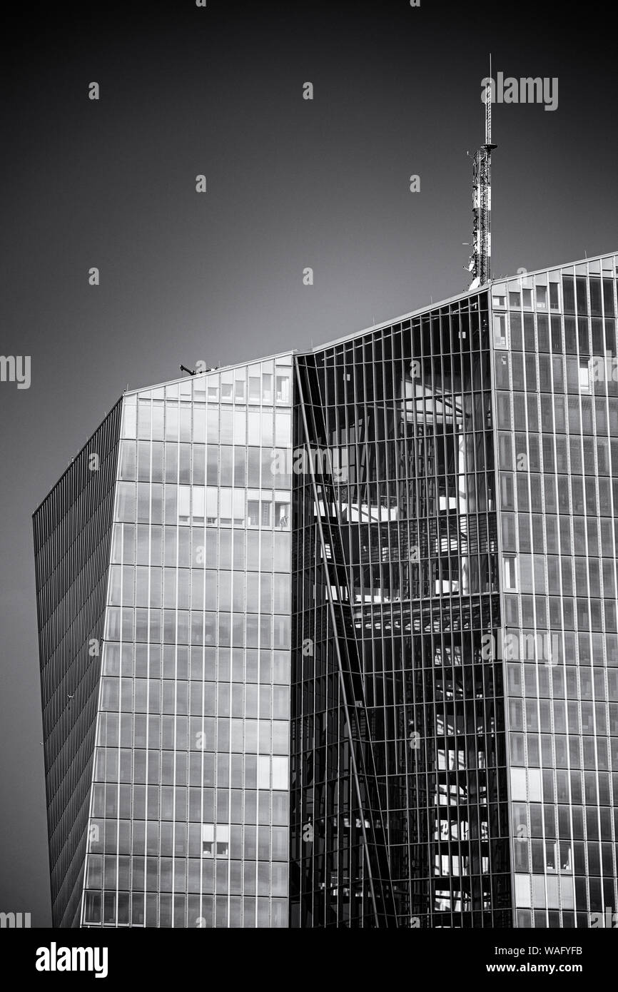 European Central Bank (ECB) in detail. Black and white with a dramatic sky. Stock Photo