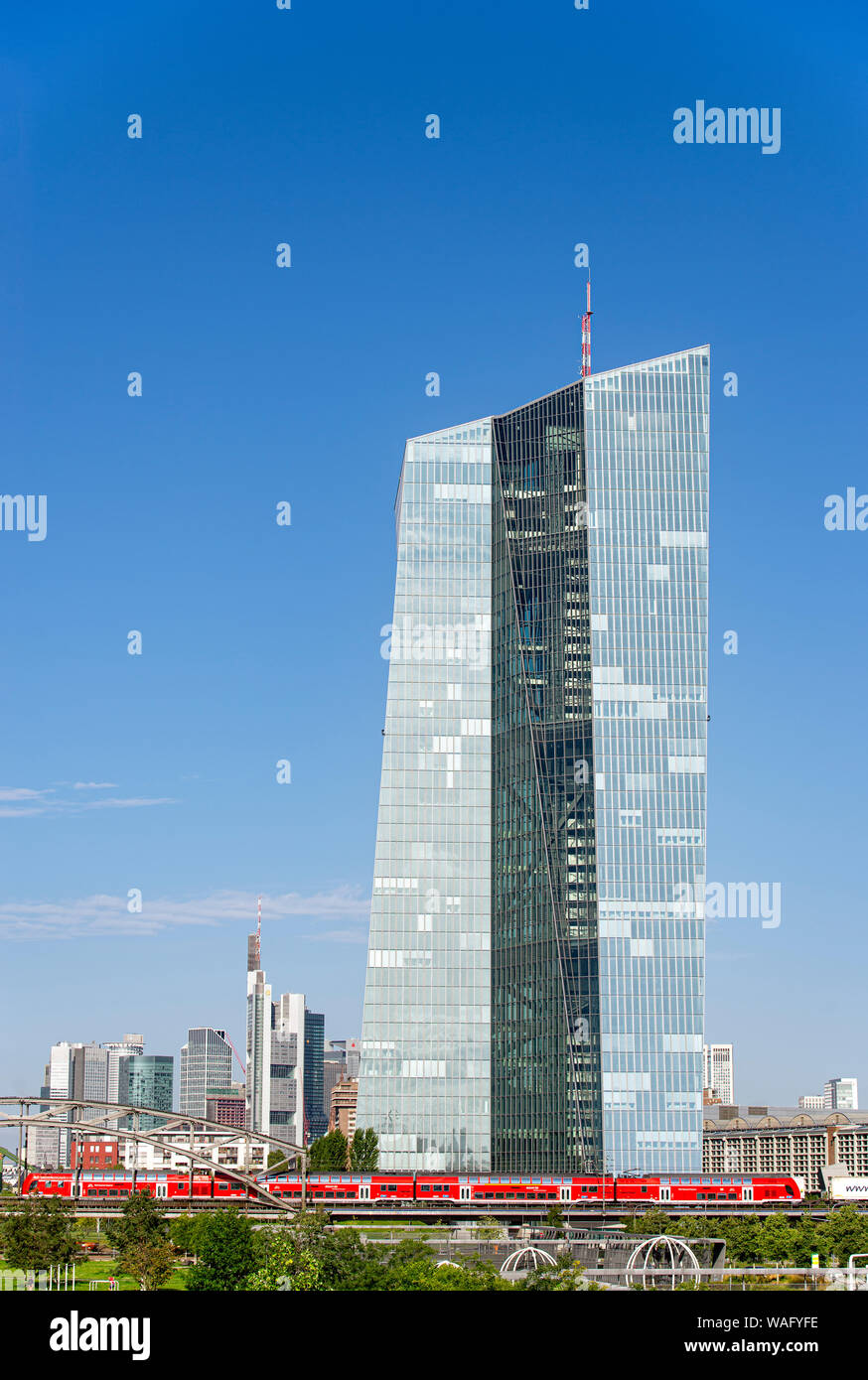 European Central Bank (ECB) with the skyline of Frankfurt in the background Stock Photo