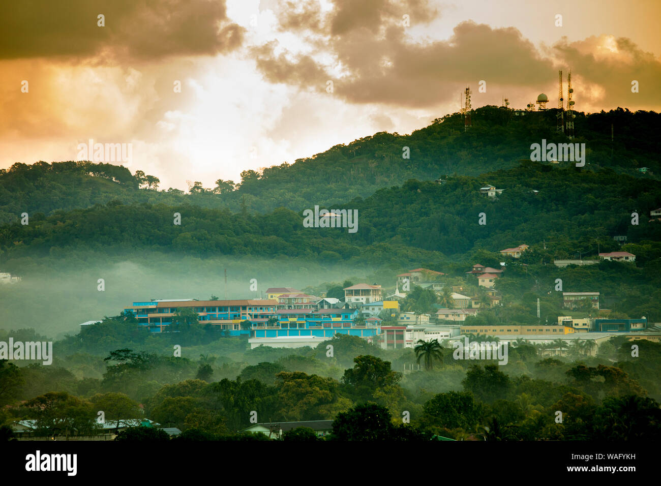 View of Coxen Hole, Roatan, Honduras at dawn with fog. Stock Photo