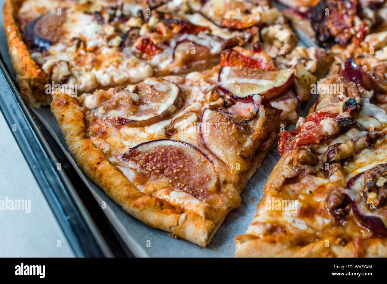 Fig Pizza with Walnut and Sun Dried Tomatoes. Traditional Organic Fast ...