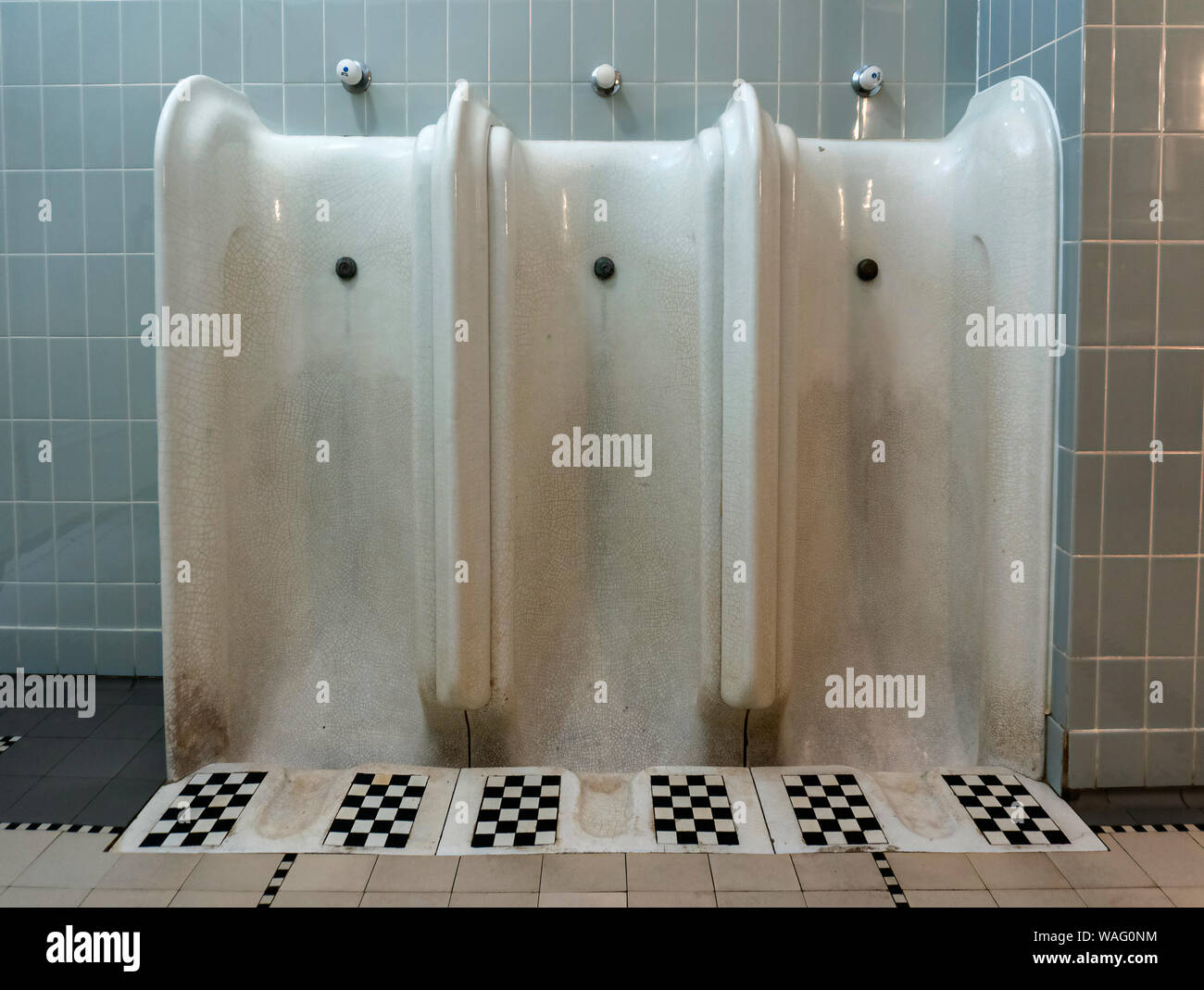 Urinal in a historic building Stock Photo