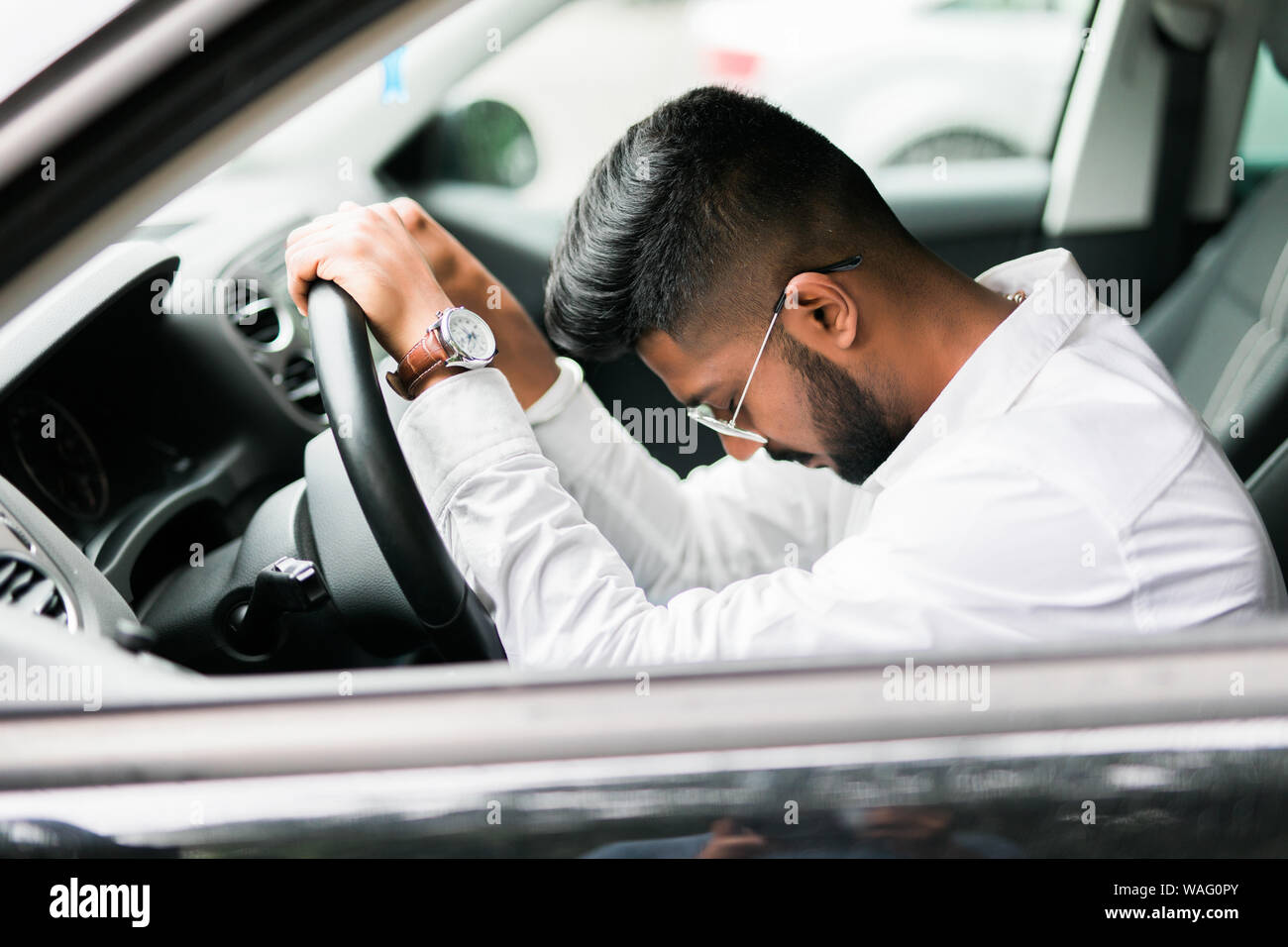 Closeup portrait tired young handsome man with short attention span
