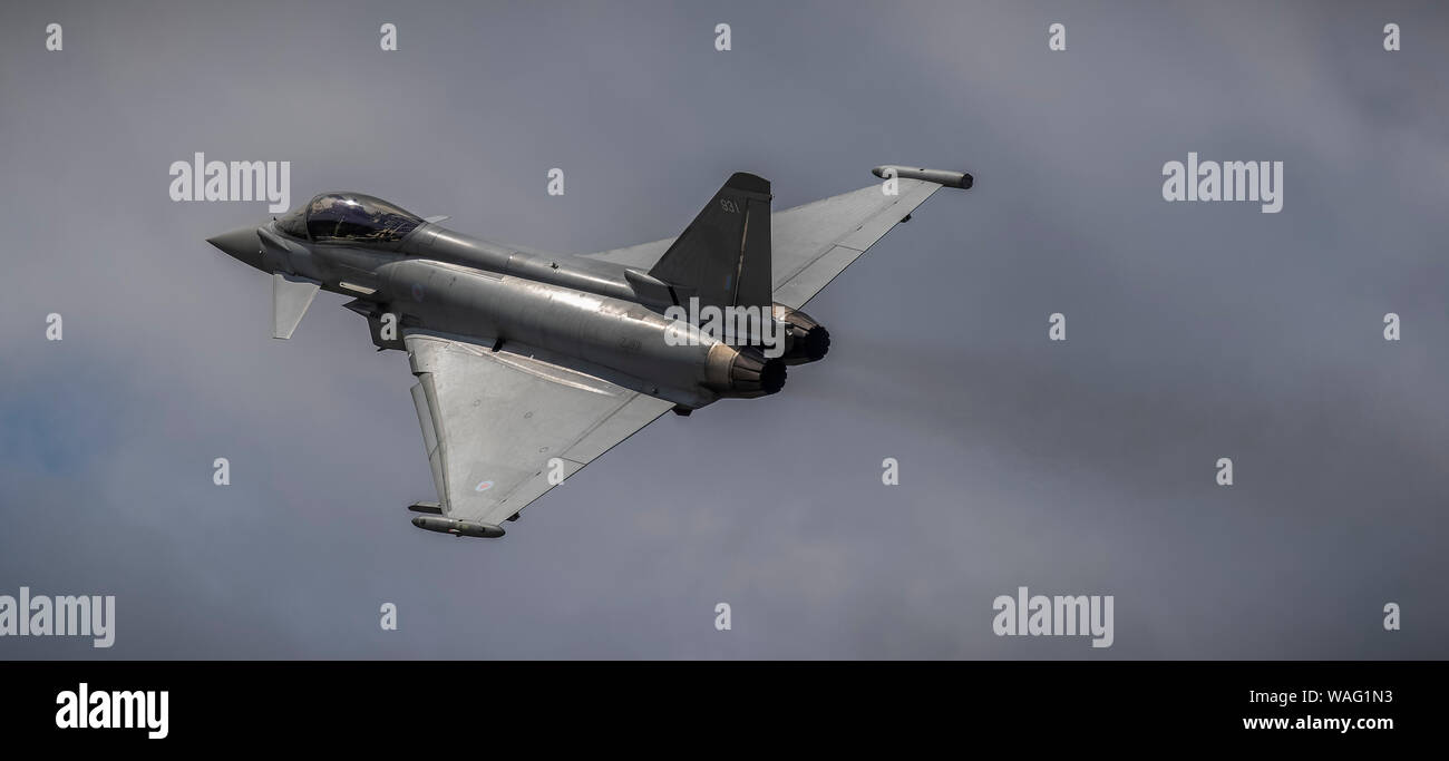 Very fast and very noisy RAF Eurofighter Typhoon Jet in the sky Stock Photo