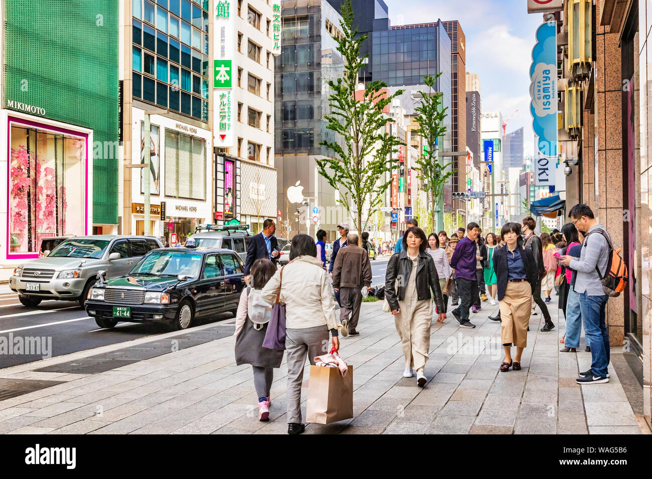 7 April 2019: Tokyo, Japan - Shopping in the Ginza District, considered one of the most expensive and luxurious shopping areas in world. Stock Photo