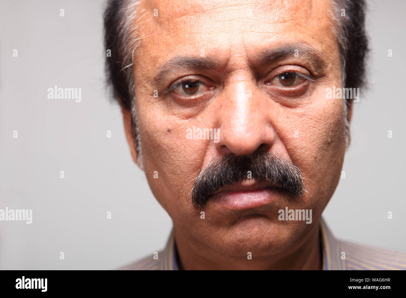 Old man looking sad Stock Photo