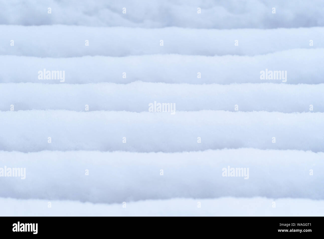 Background Snow Covered Slats Of City Park Bench Outdoor