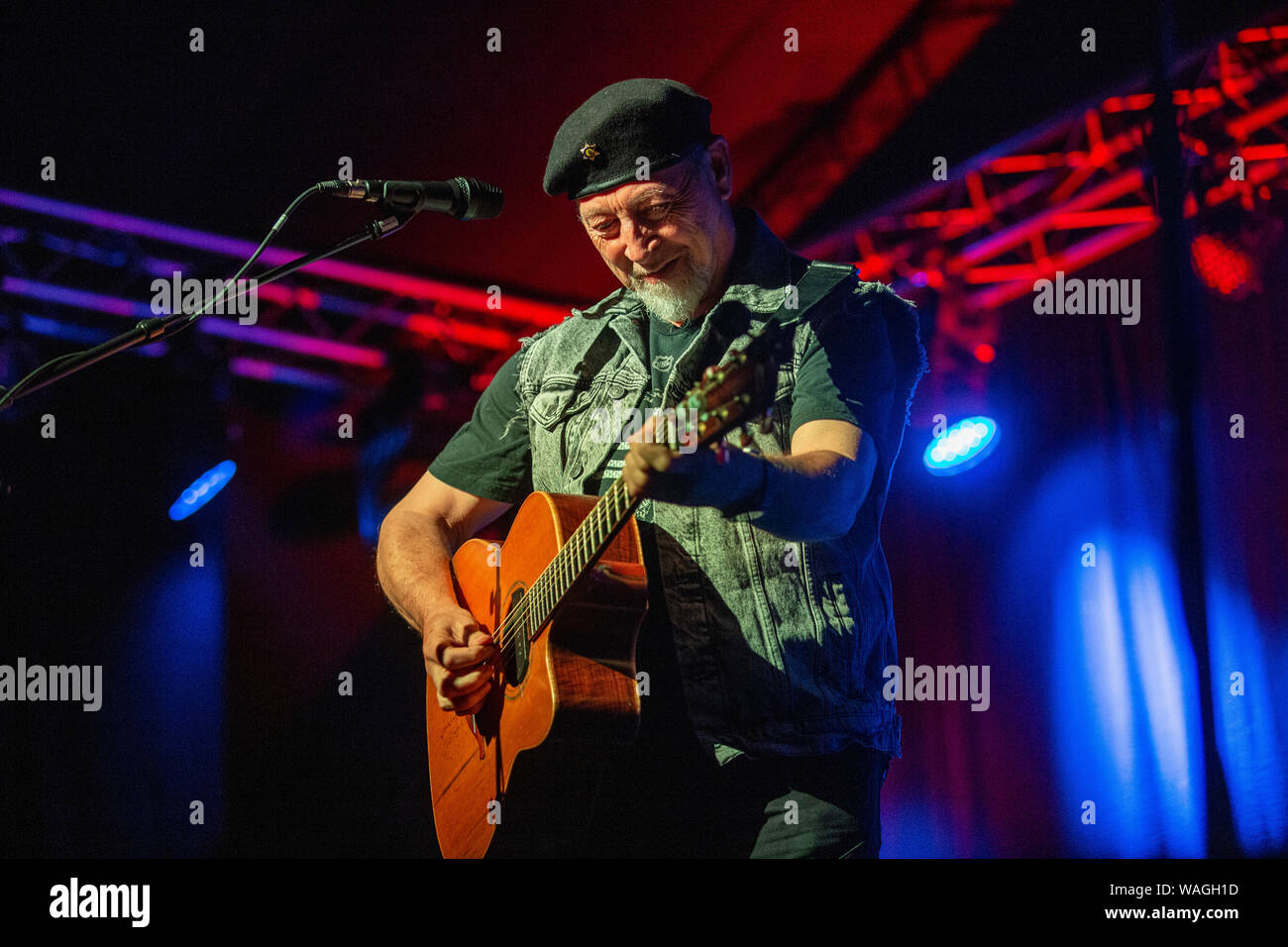 Singer songwriter and acclaimed guitarist Richard Thompson at the 2019 Sidmouth Folk Week Festival. Stock Photo