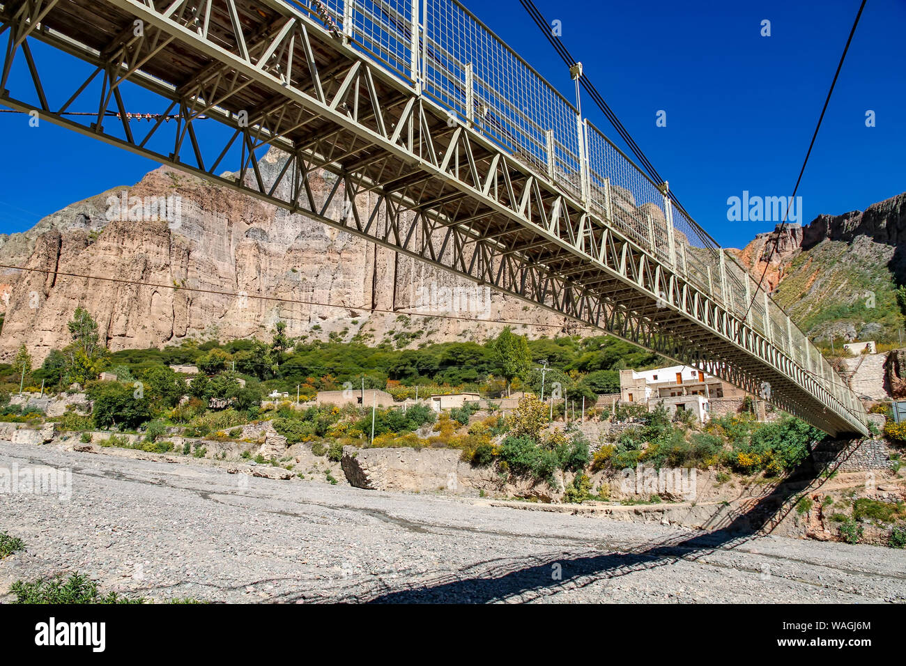 View on under a bridge in Iruya, Argentina, South America on a sunny day. Stock Photo
