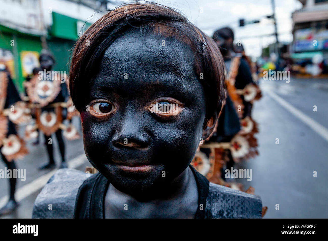 A Filipino Child Takes Part In A Children’s Parade During The Ati-Atihan Festival, Kalibo, Panay Island, Aklan Province, The Philippines Stock Photo