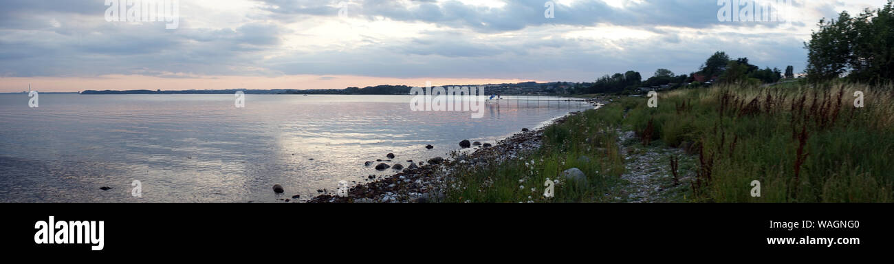 Sunset on the Baltic sea coast of Denmark Stock Photo