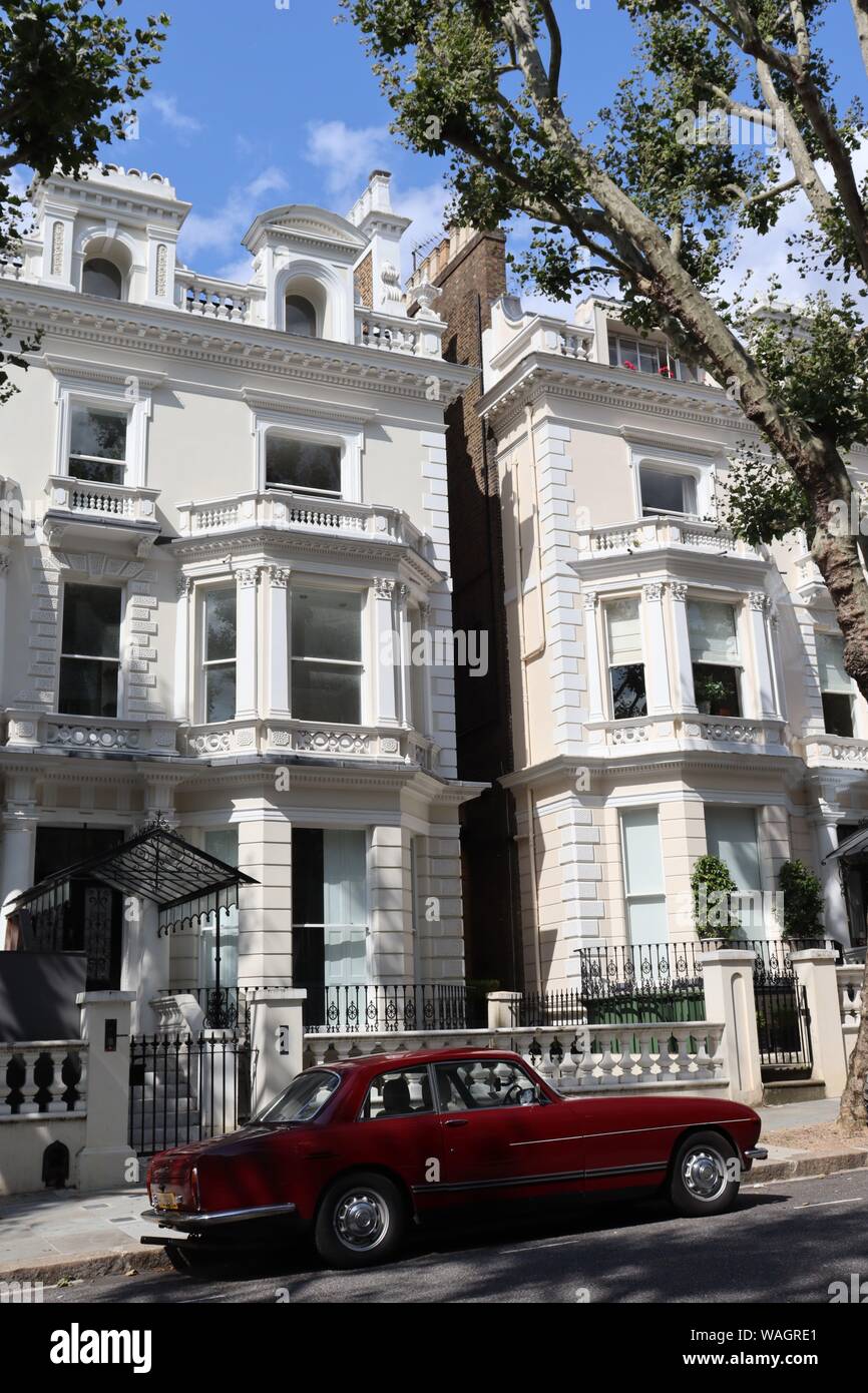Classic car outside white houses in London's Kensington Stock Photo Alamy
