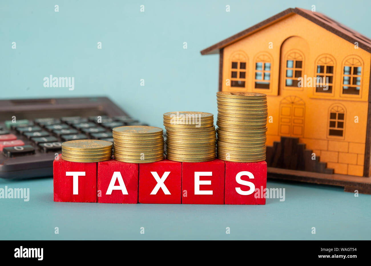 Increase in property taxes concept visualised with coins stack Stock