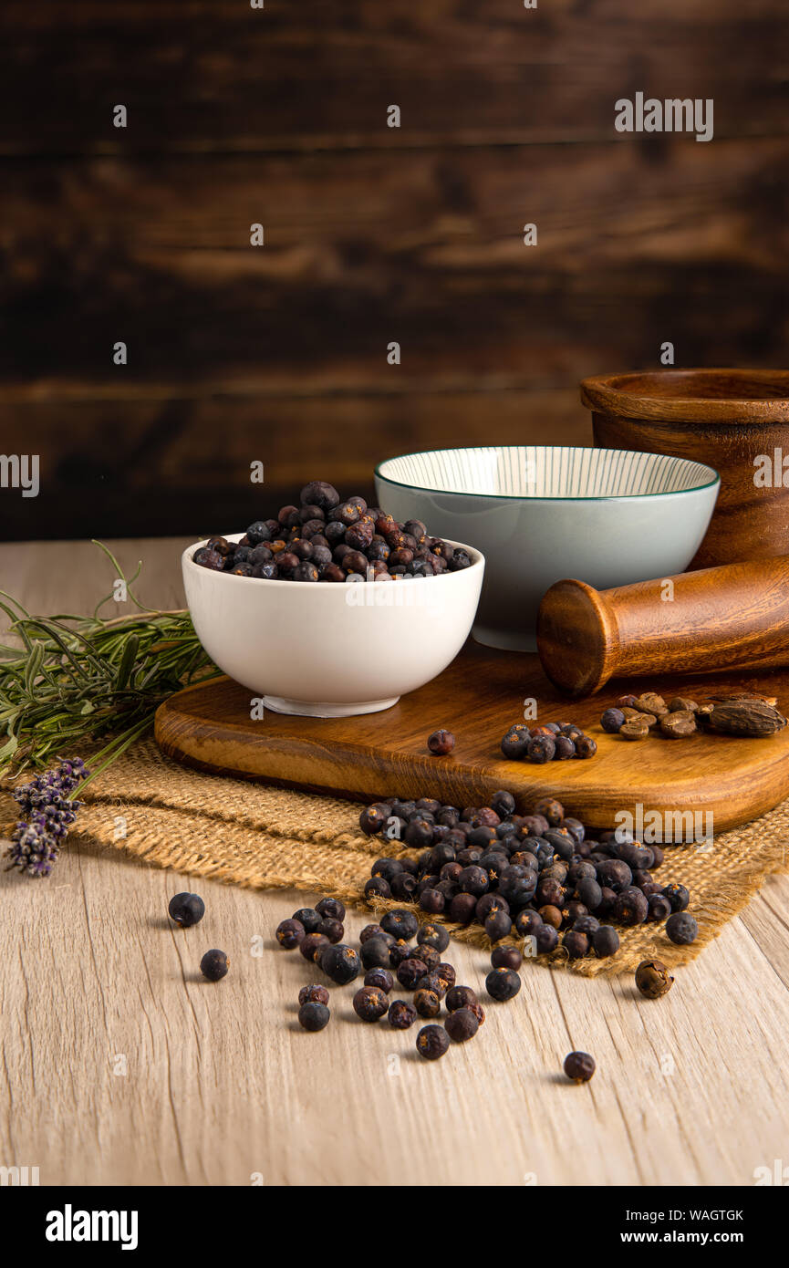 Juniper Berries in a bowl and food preparation and kitchen setting