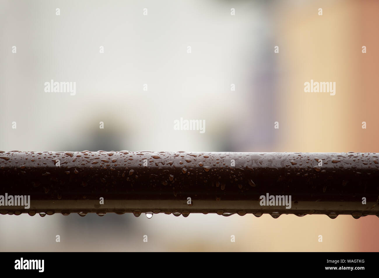 Water droplets from rain over the hand rail Stock Photo