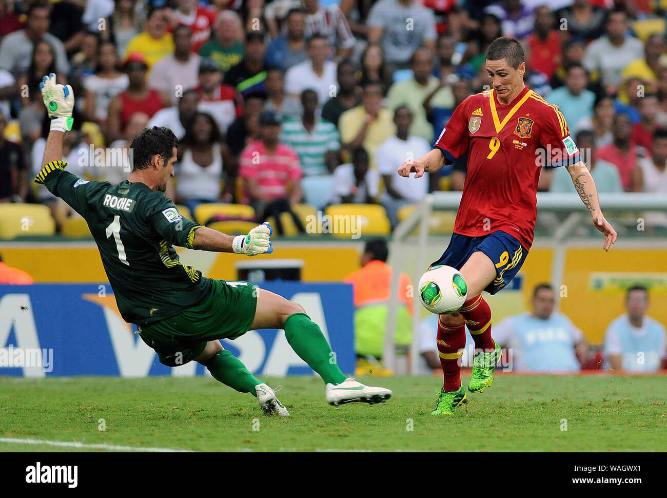 Rio de Janeiro, Brazil, June 20, 2013. Spanish soccer player Fernando Torres kicks the ball to score his goal in the match Spain vs Tahiti in the fina Stock Photo