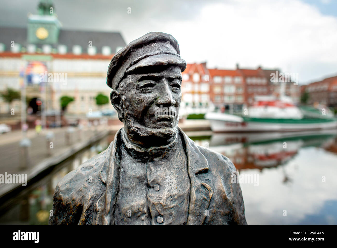 At emden harbor with view to city and town hall hires stock