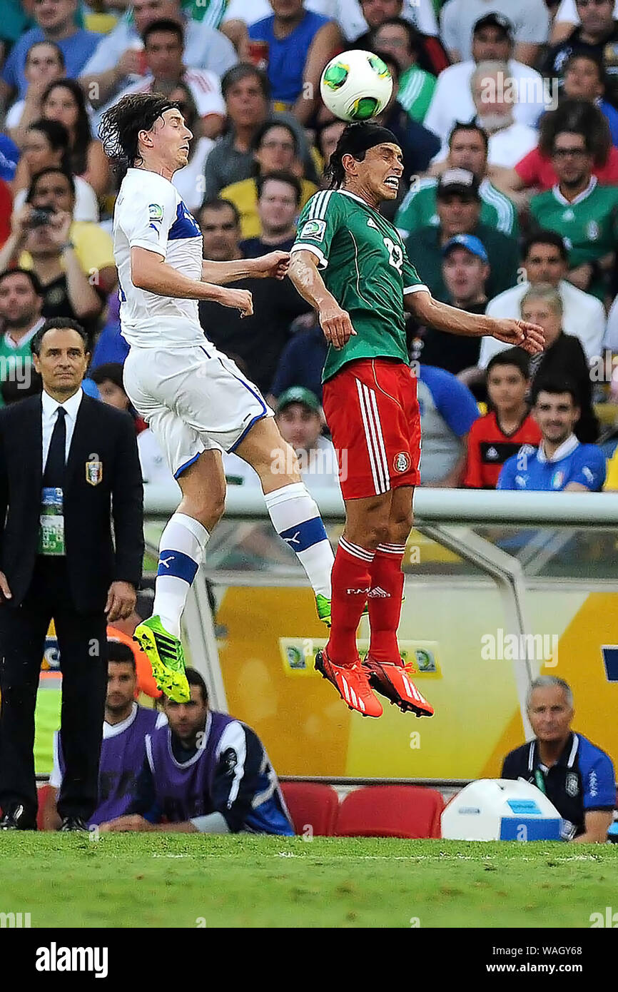 Rio de Janeiro, Brazil, June 16, 2013. Players playing the ball during the match Mexico vs Italy for the Confederations Cup at Maracana Stadium Stock Photo