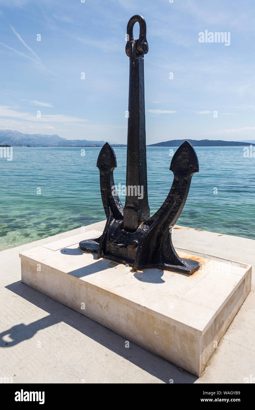 Kastel Stari, Big ancient anchor on the shore od Adriatic sea Stock Photo