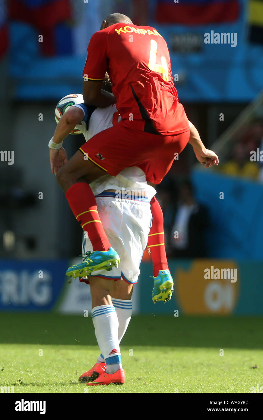 Rio de Janeiro, June 18, 2014. Football players dispute the ball during the match  Russia vs Belgium for the 2014 World Cup at the Maracanã Stadi Stock Photo