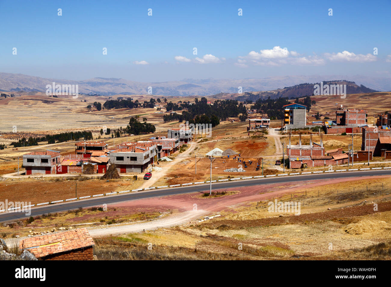 Buildings under construction at Nuevo Chinchero, near the original village of Chinchero, financed by compensation for land bought by the government from familiies for the construction of a new airport for Cusco and Machu Picchu, Cusco Region, Peru Stock Photo