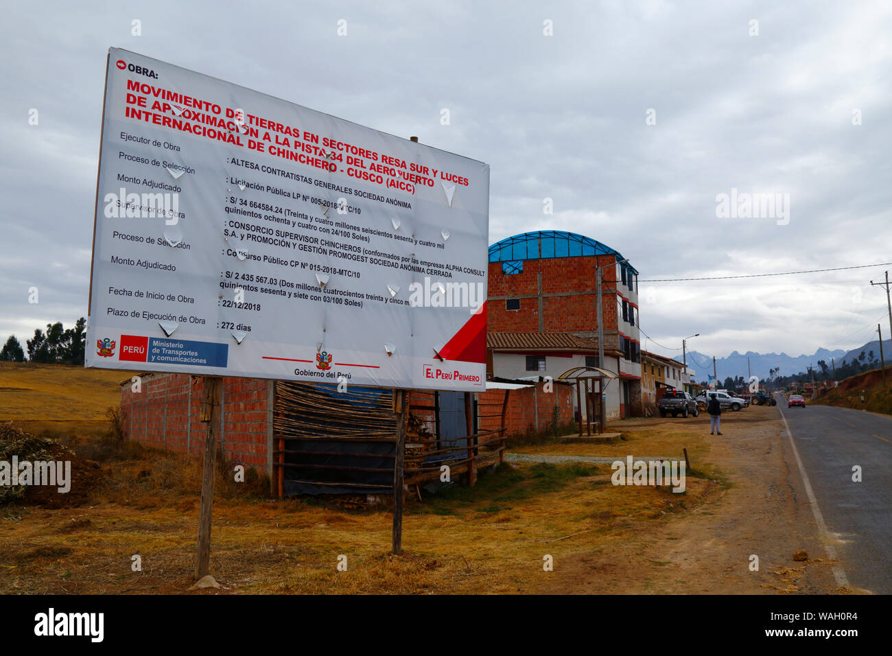 Sign announcing details of earth moving works, the start of the construction of a new international airport at Chinchero for Cusco and Machu Picchu. Cusco Region, Peru Stock Photo