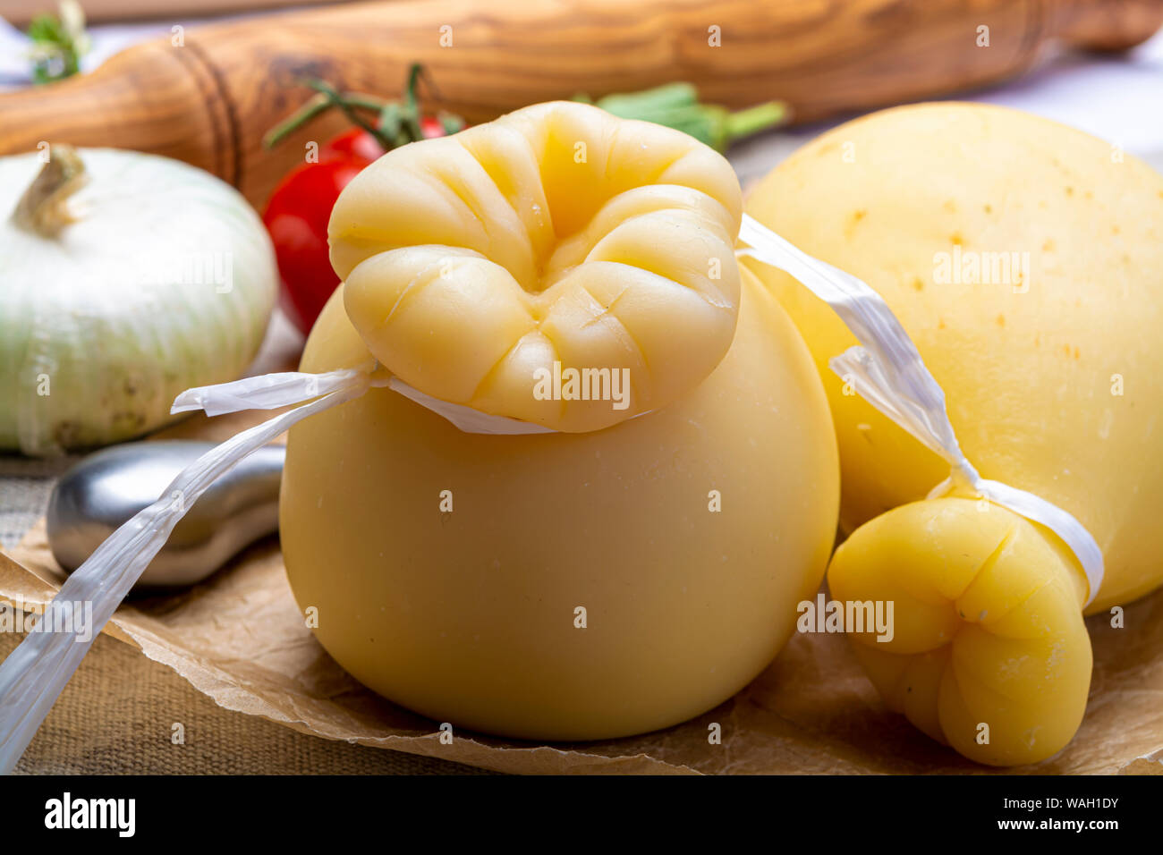 Cheese collection, Italian provolone or provola caciocavallo hard cheeses in teardrop form