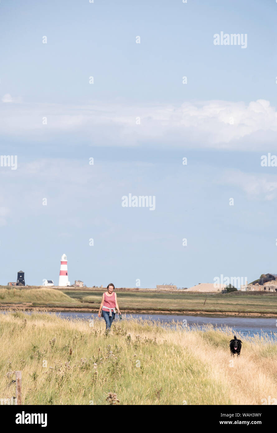 Walking besides the River Ore at Orford, Suffolk coast, England, UK Stock Photo