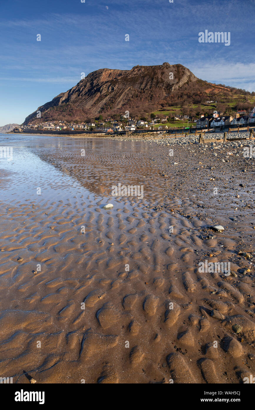 Beach and headland at Llanfairfechan on the North Wales coast Stock Photo