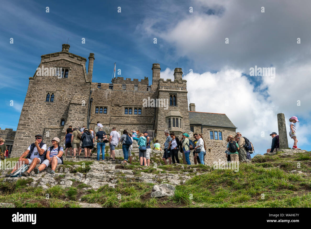 St. Michael's Mount, Marazion in West Cornwall, England. Tuesday 20th August 2019. UK Weather: On a warm summer's day with sunny intervals and occasional heavy cloud cover, tourists queue to enter the Benedictine Monastery on top of St Michaels Mount in Marazion, West Cornwall. Credit: Terry Mathews/Alamy Live News Stock Photo