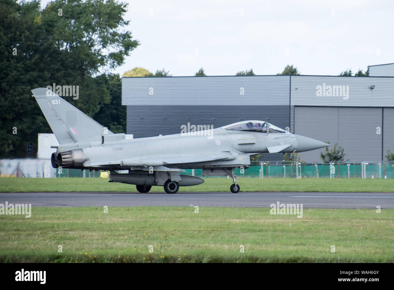 Full view of RAF typhoon taxiing towards runway at Bigginhill airport Stock Photo