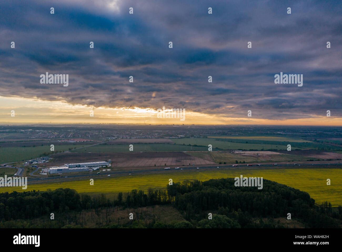 Aerial drone photography of the city suburbs, highway around the main city. Stock Photo