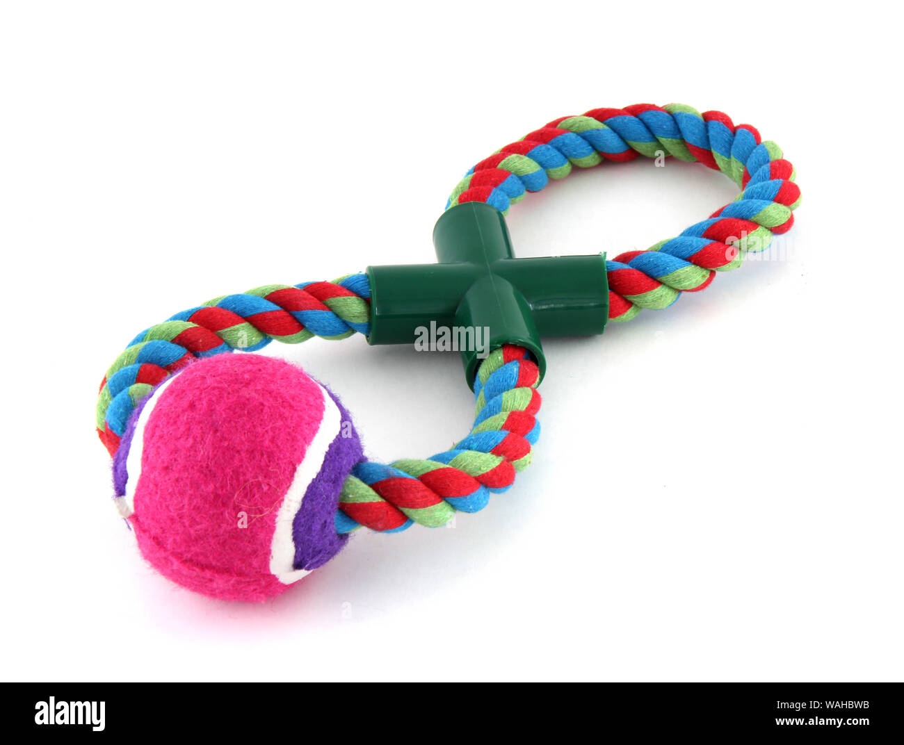 It's a pink tennis ball on a rope. It's for playing with a dog and dragging. Stock Photo