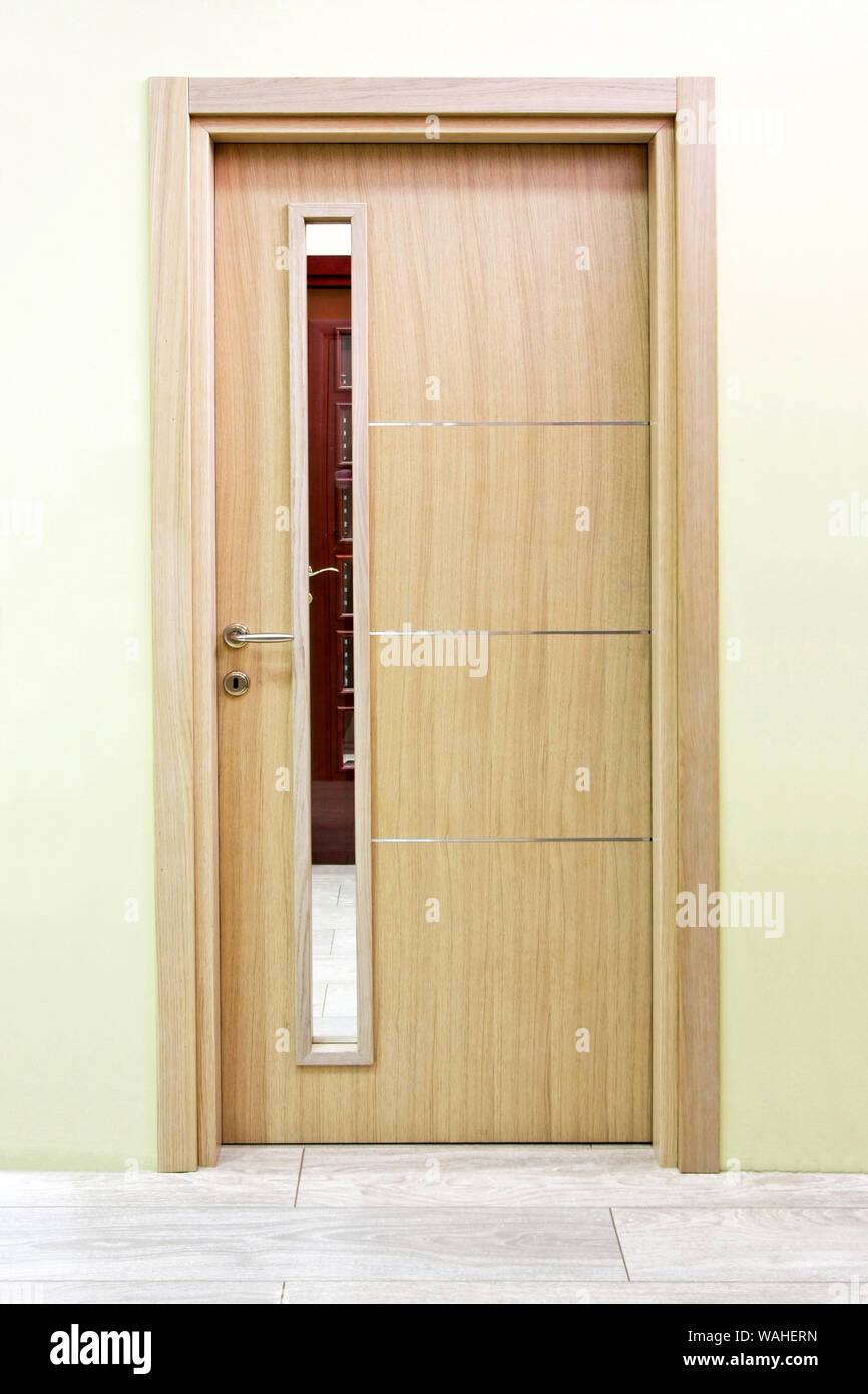 Light wood door with long window decor Stock Photo Alamy