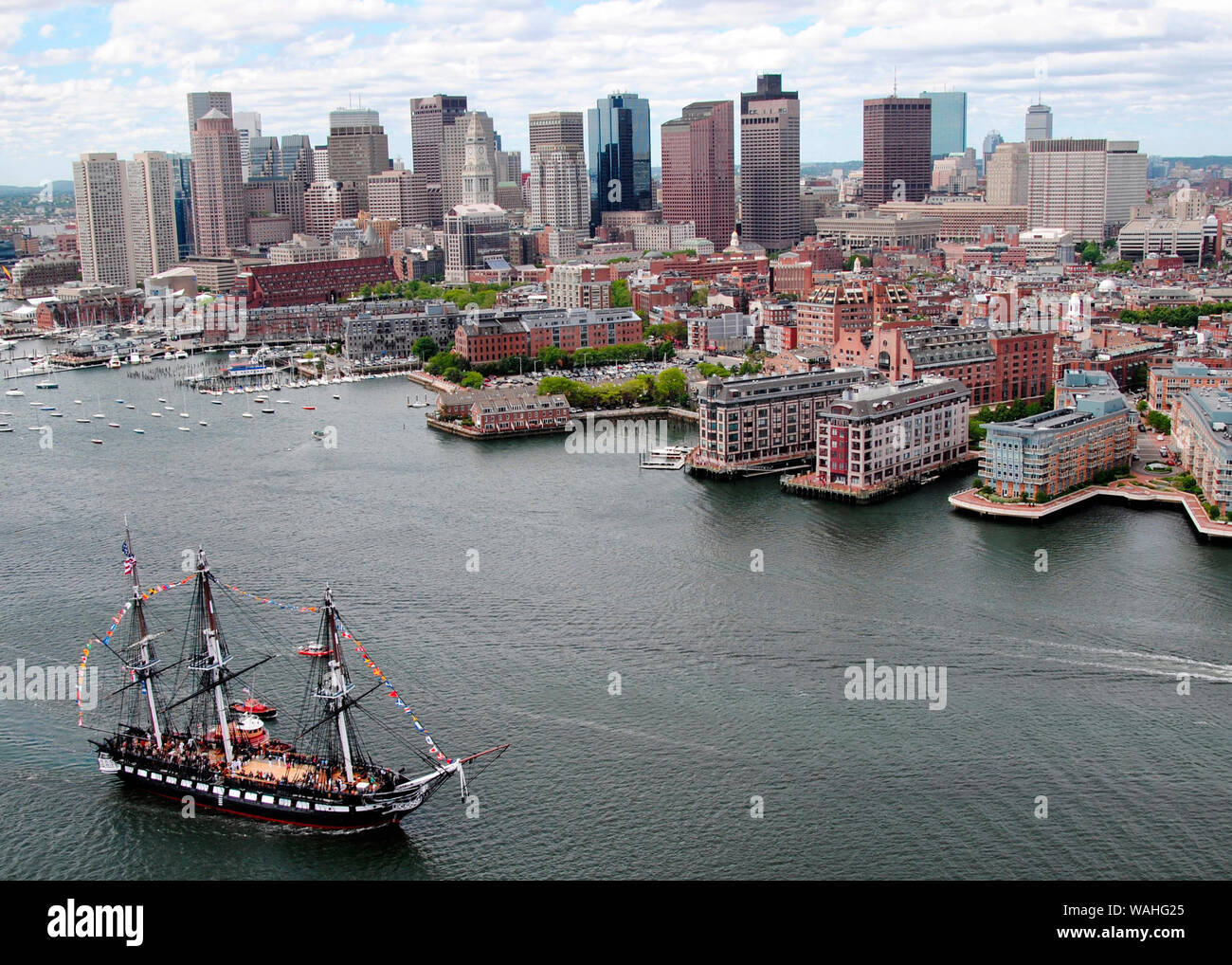 USS Constitution sails into Boston Harbor during an underway Battle of Midway commemoration. The underway honored approximately 200 members of Gold Star Families who lost loved ones in Operations Enduring and Iraqi Freedom and the Navy's victory at Midway Island in World War II. June 3, 2011 Stock Photo