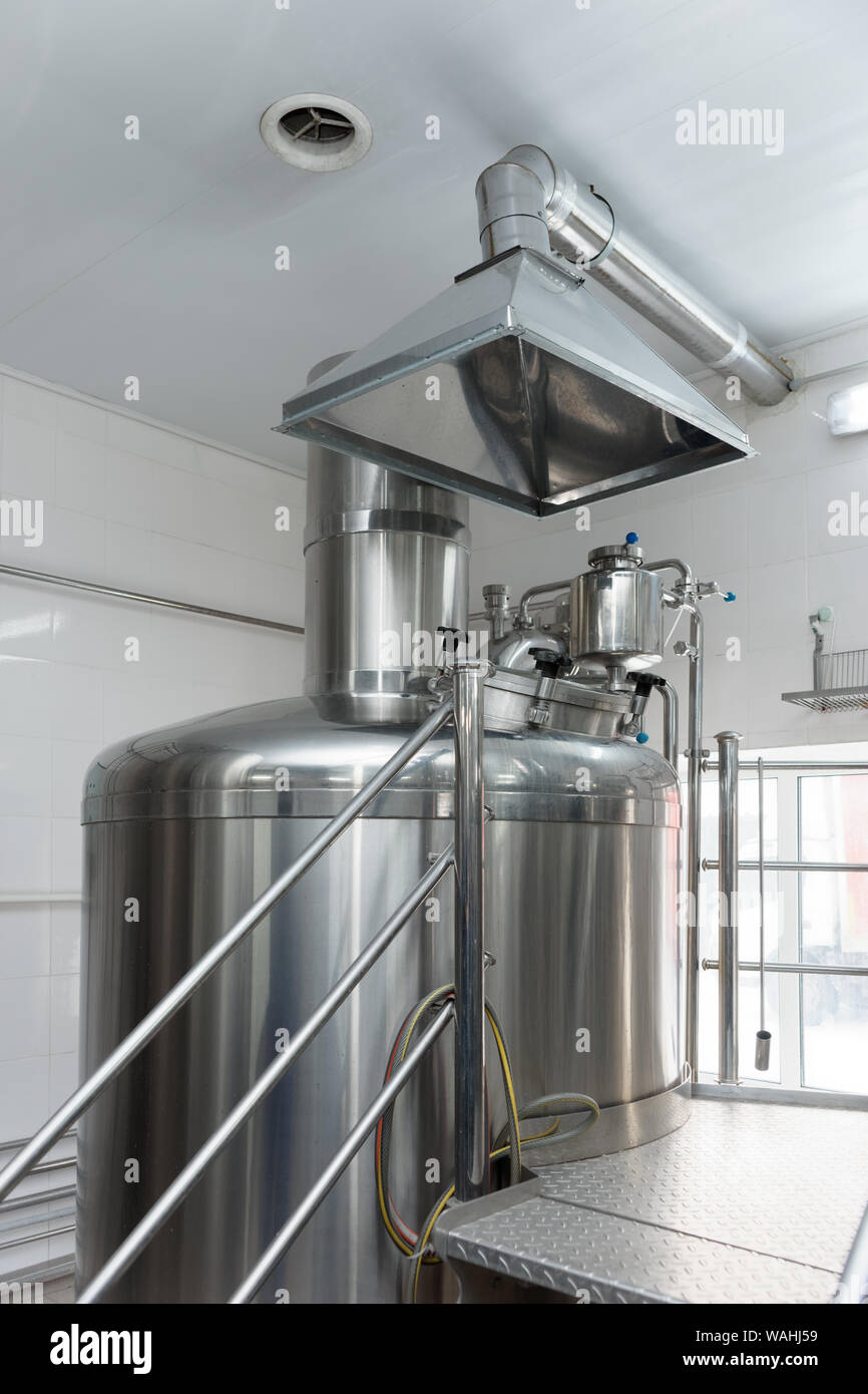 Mash mixing vat and ventilation hood, brewery equipment Stock Photo - Alamy