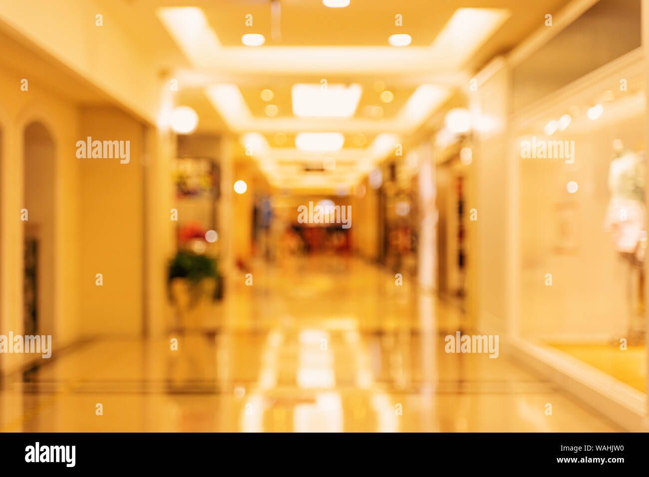 Luxury department store shopping mall interior, abstract defocused blur  with bokeh background, concept of shopping seasons design Stock Photo -  Alamy